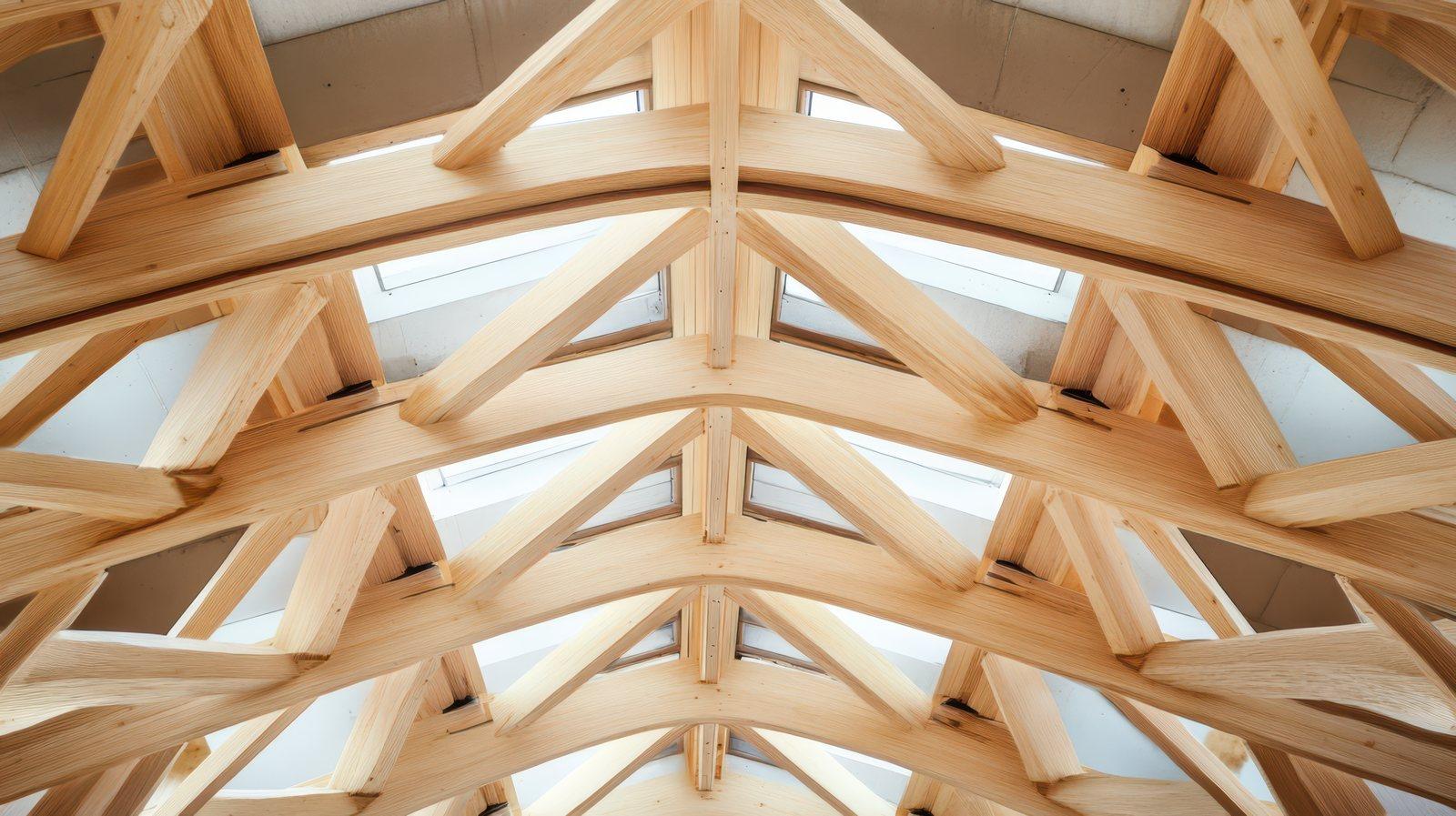 Wooden roof truss framework viewed from below