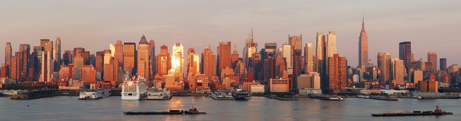 Manhattan skyline at sunset viewed across the Hudson River